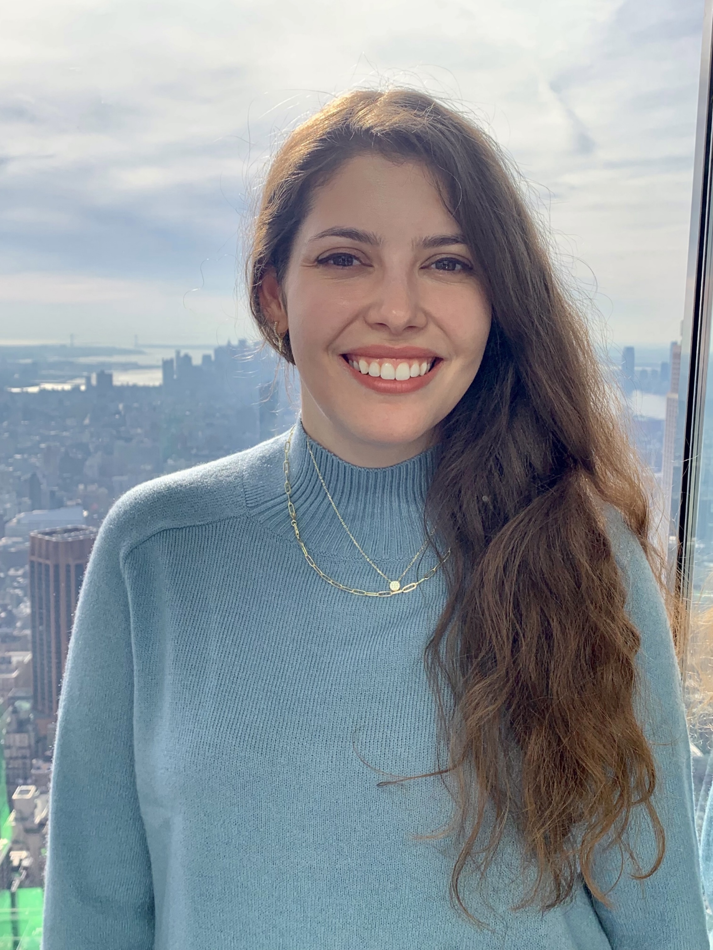 a person smiling at the camera