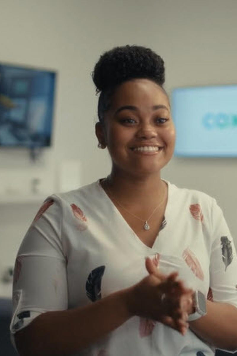 Cox employee smiling at the camera