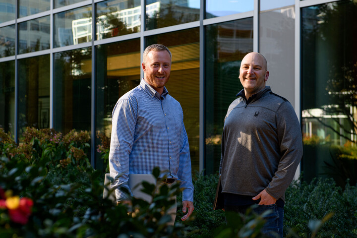 Cox Automotive employees standing in front of the office building