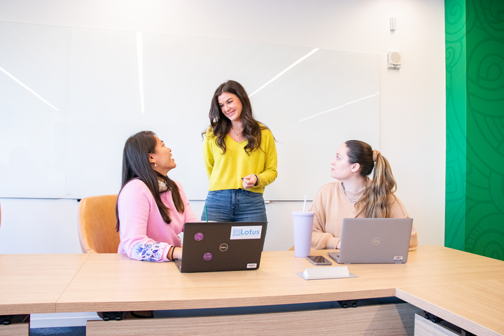 Cox Communications employees in a meeting