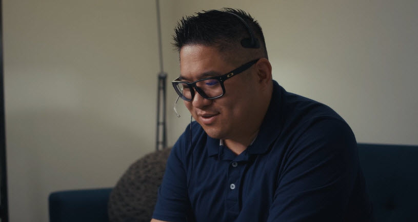 Cox employee wearing a headset
