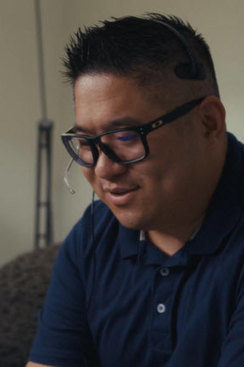 Cox employee wearing a headset