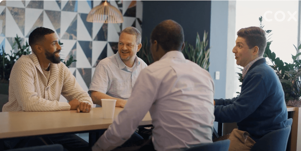 RapidScale employees collaborating around a table