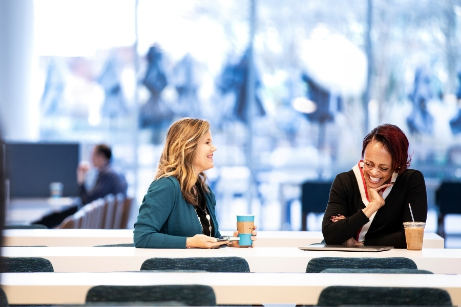 Cox Employees working in the office cafe