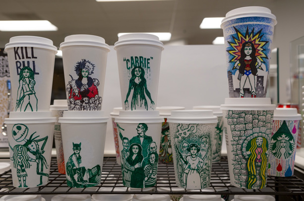 Turning a coffee cup into a work of art? That's just one of T's many artistic skills!