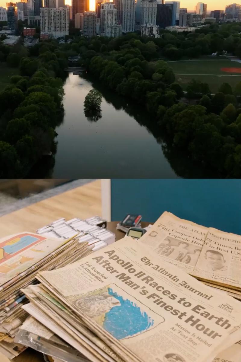 a river with newspapers and a road with trees