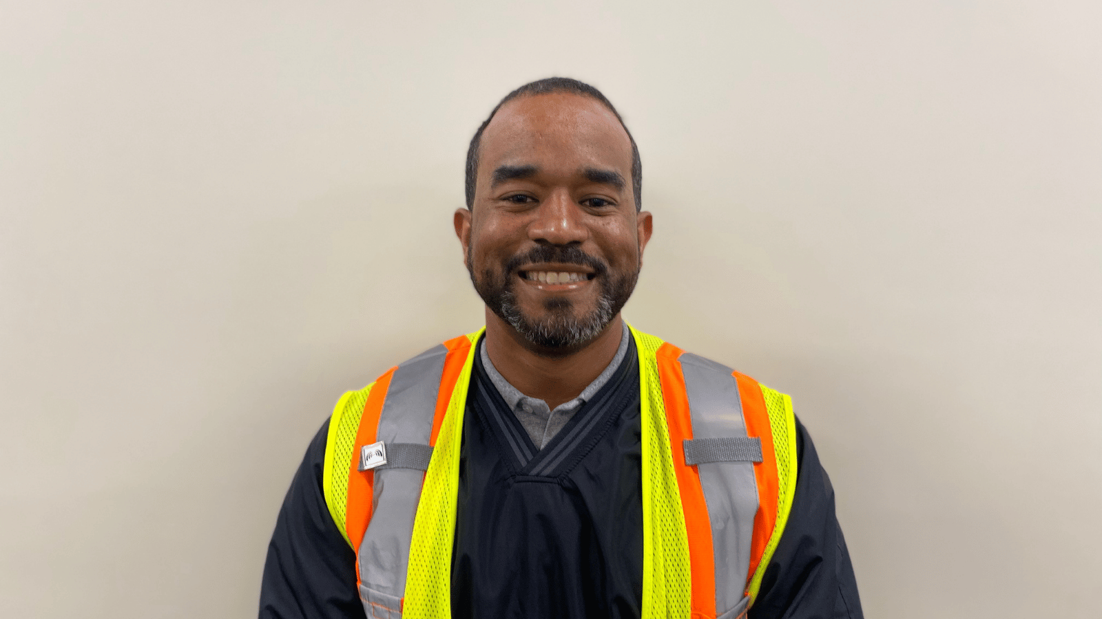 Cox employee smiling at camera