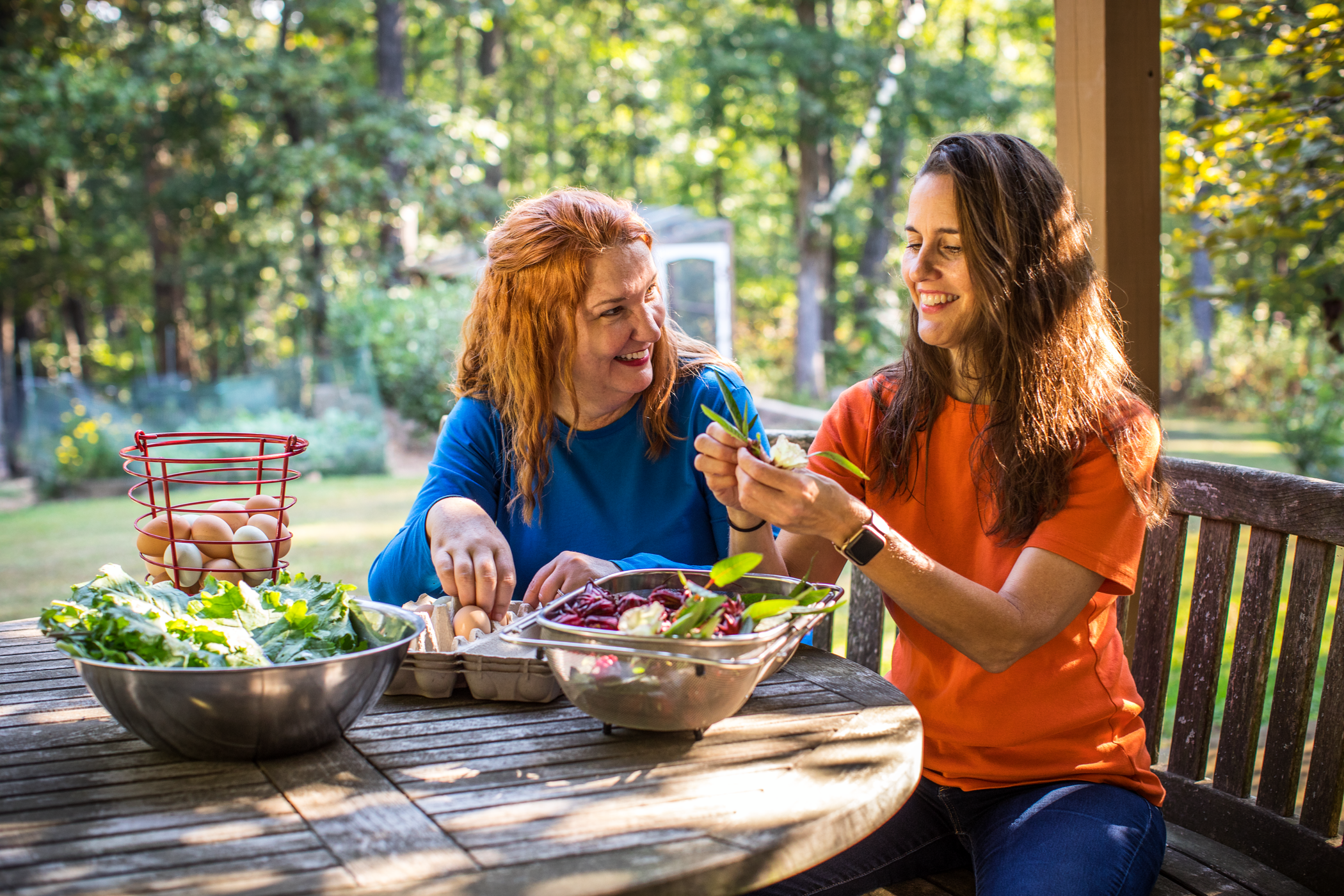 Cox employees preparing a salad