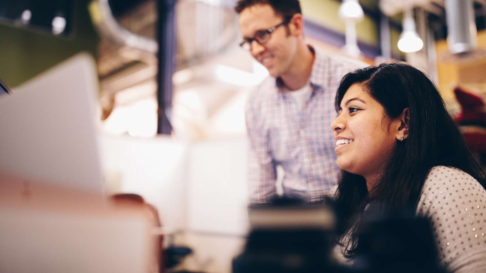 Autotrader employees working at computer