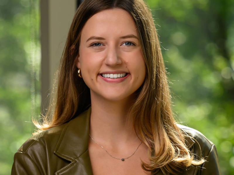 a person smiling at camera
