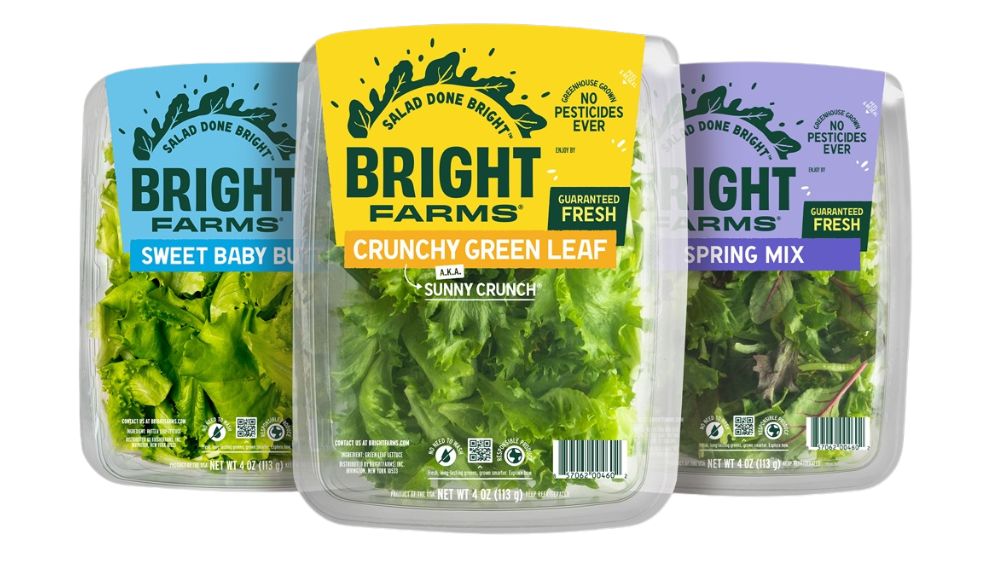 a group of plastic containers with green and yellow labels