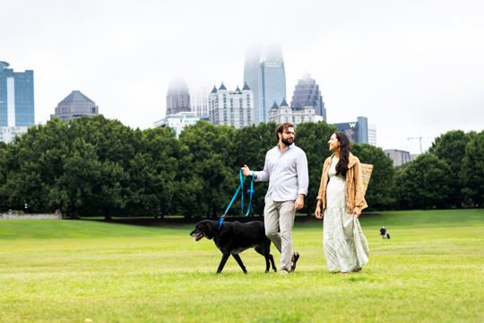 Cox Enterprises employee Mia Cahal enjoys time at Piedmont Park with her husband and dog.