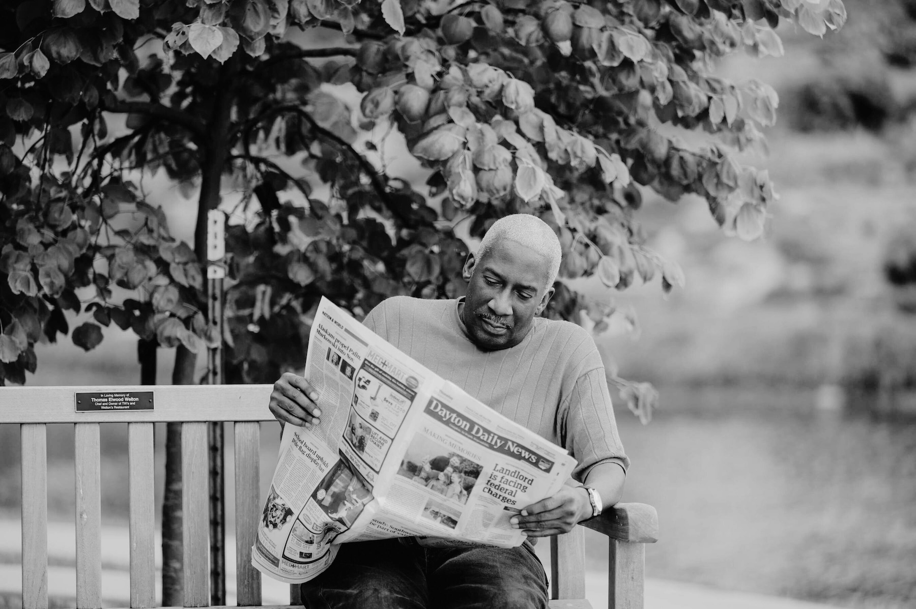 Dayton Daily News employee reading newspaper