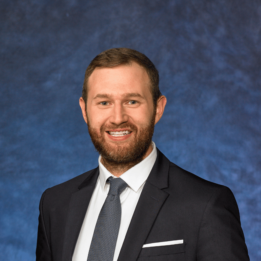 a Cox employee smiling at camera