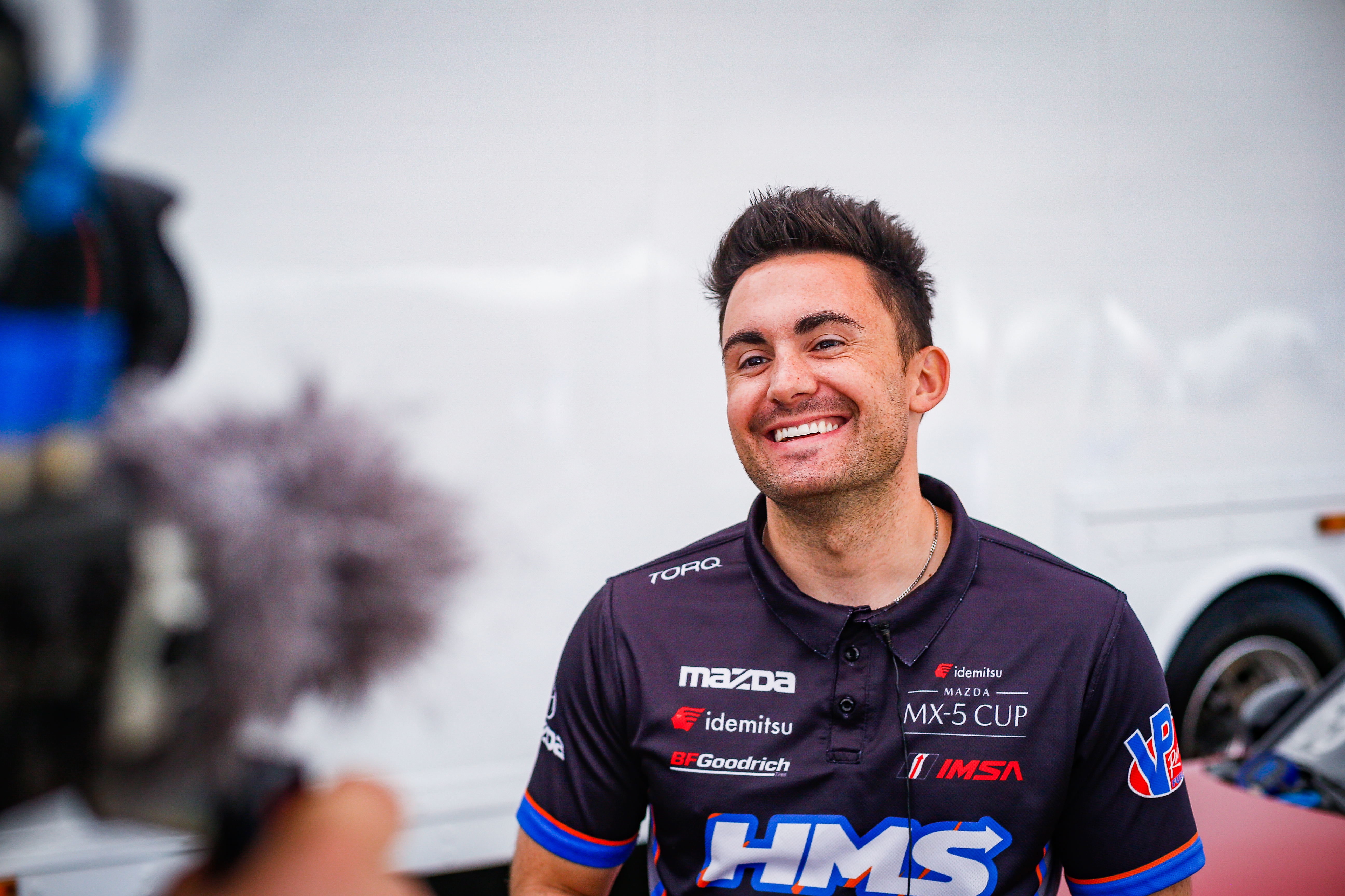 Bryce Cornet Cox employee in racing outfit
